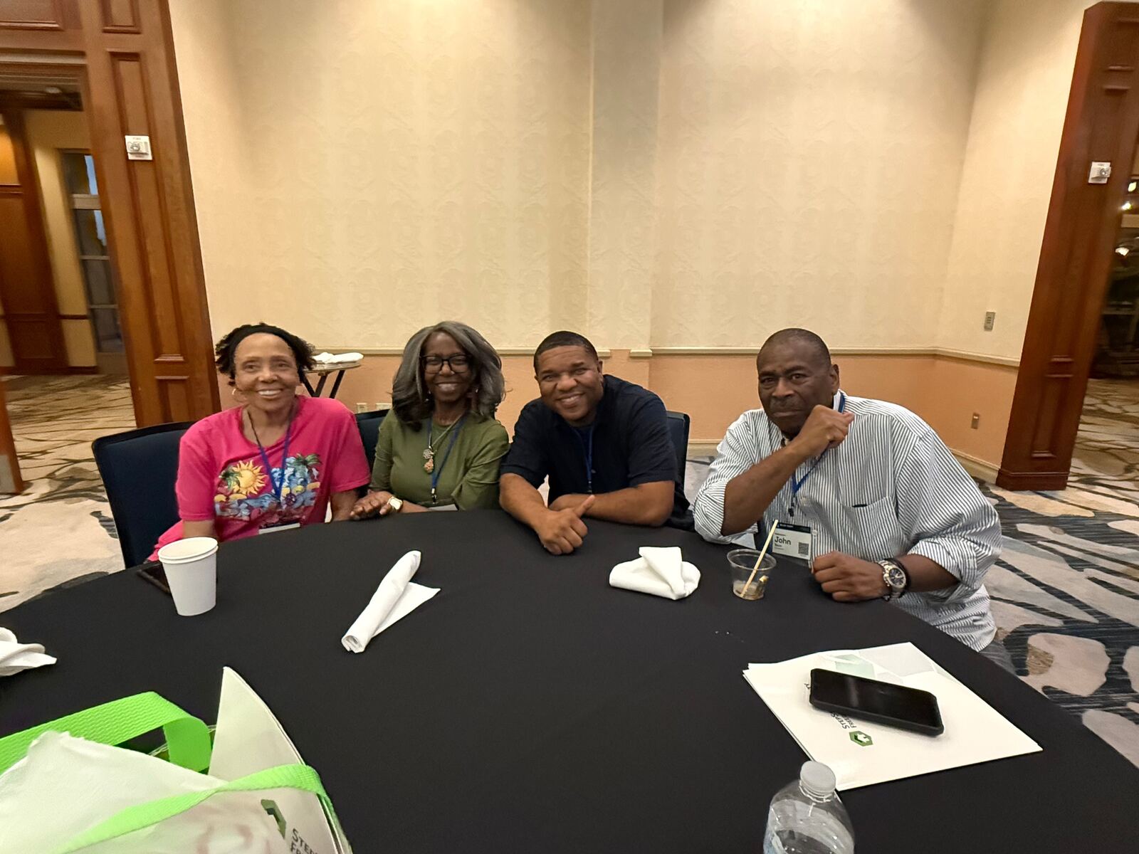 New friends at a convention table